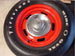 Chevy Rally Wheels with Firestone F70-15 Wide Oval Tires, Pair, Angle 2